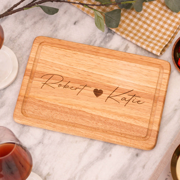 Personalised Wooden Heart And Names Chopping Board