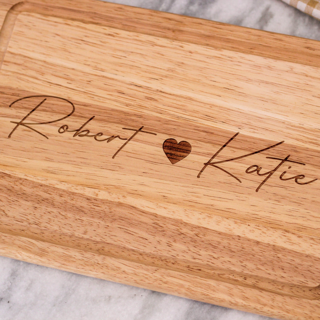 Personalised Wooden Heart And Names Chopping Board